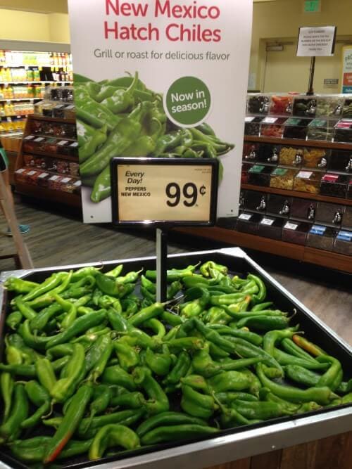 A pile of hatch green chiles at the grocery store.