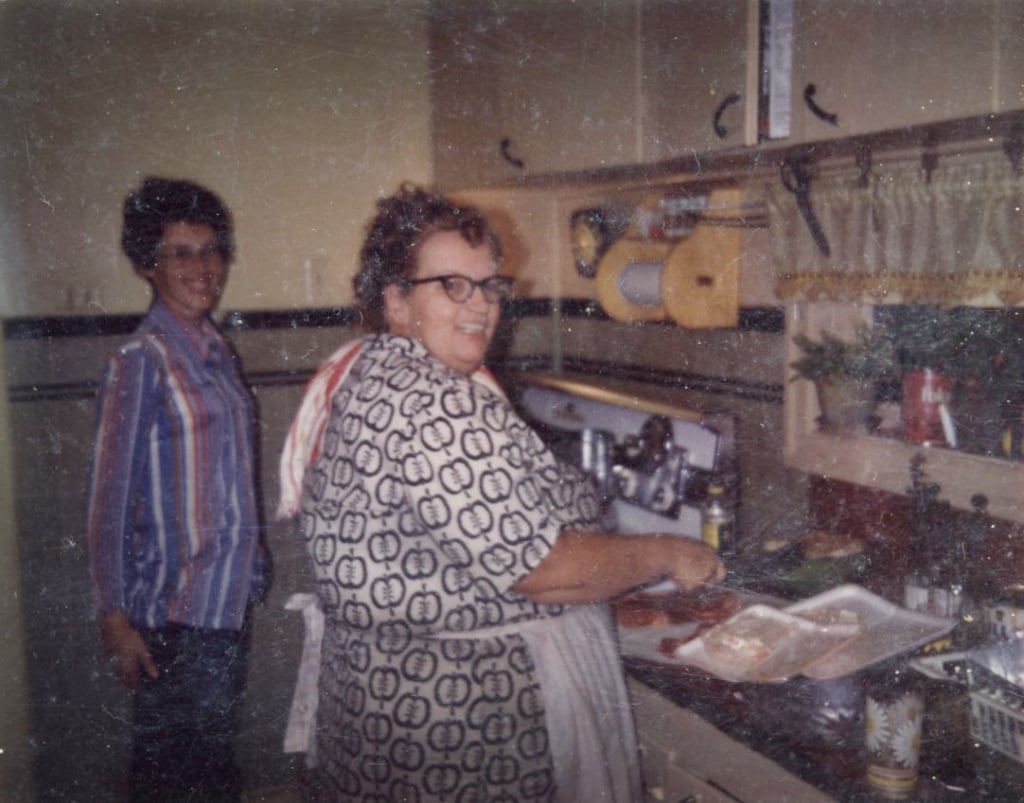 Grandma and Mom cooking dinner.