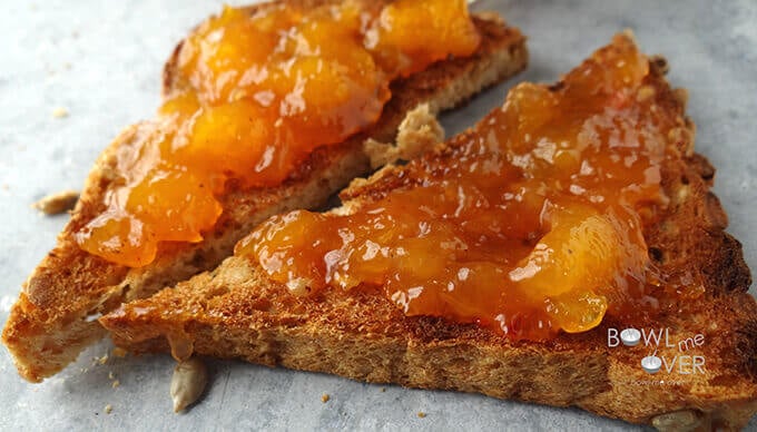 Sliced toast spread with jam.