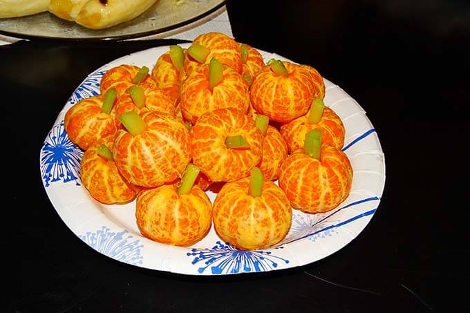 Tangerine Pumpkins on platter.