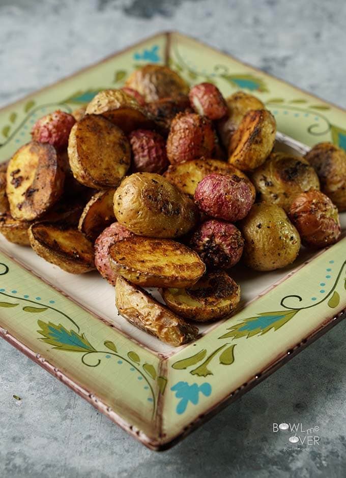 Roasted Radishes Recipe with potatoes on green plate.