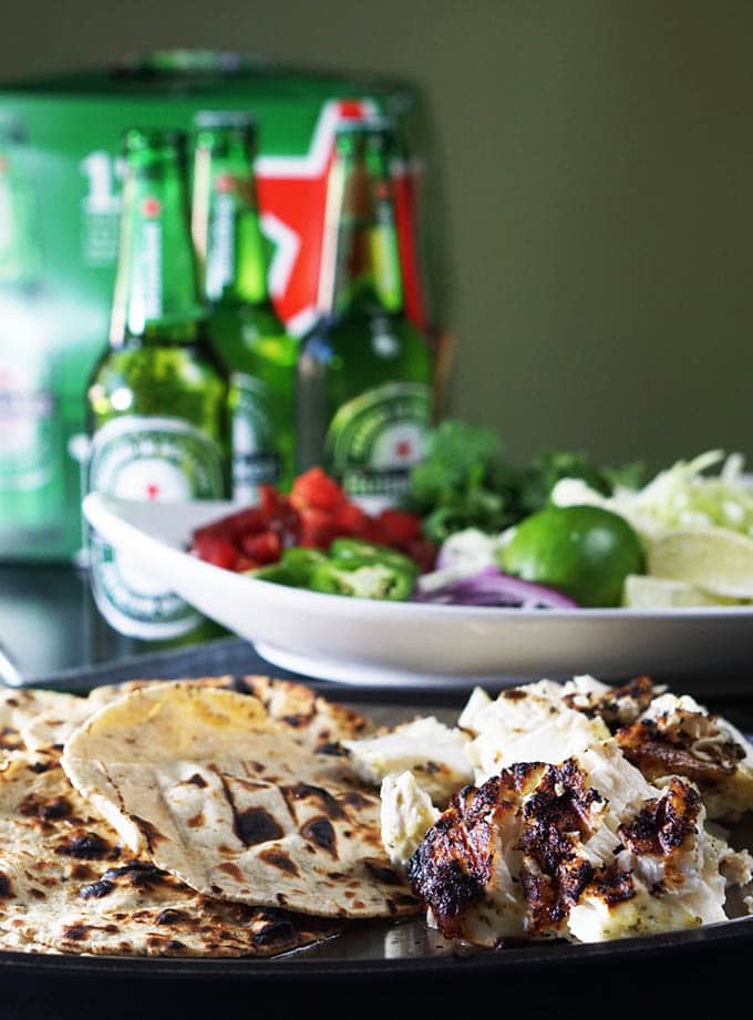 Grilled Baja Fish Tacos served with a crisp, cold Heineken is best with family & friends!