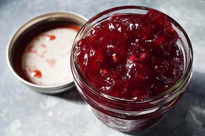 Jar filled with Pomegranate Jelly.