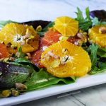 This orange salad is full of crunchy, sweet deliciousness!