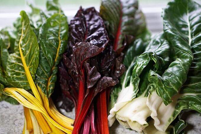 Three different types of Swiss chard, yellow, red and white.