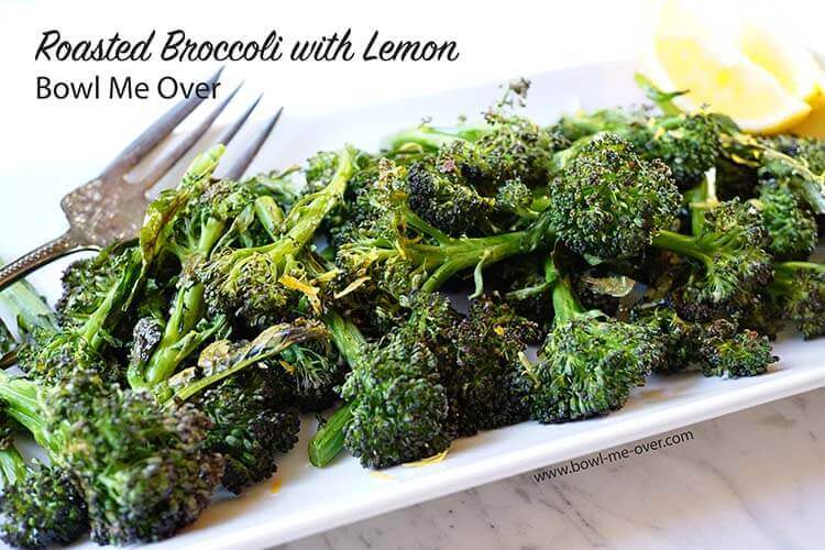 Roasted Broccoli with lemon on platter.