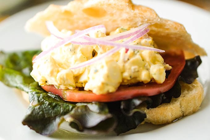Egg Salad Sandwich on a buttery croissant.