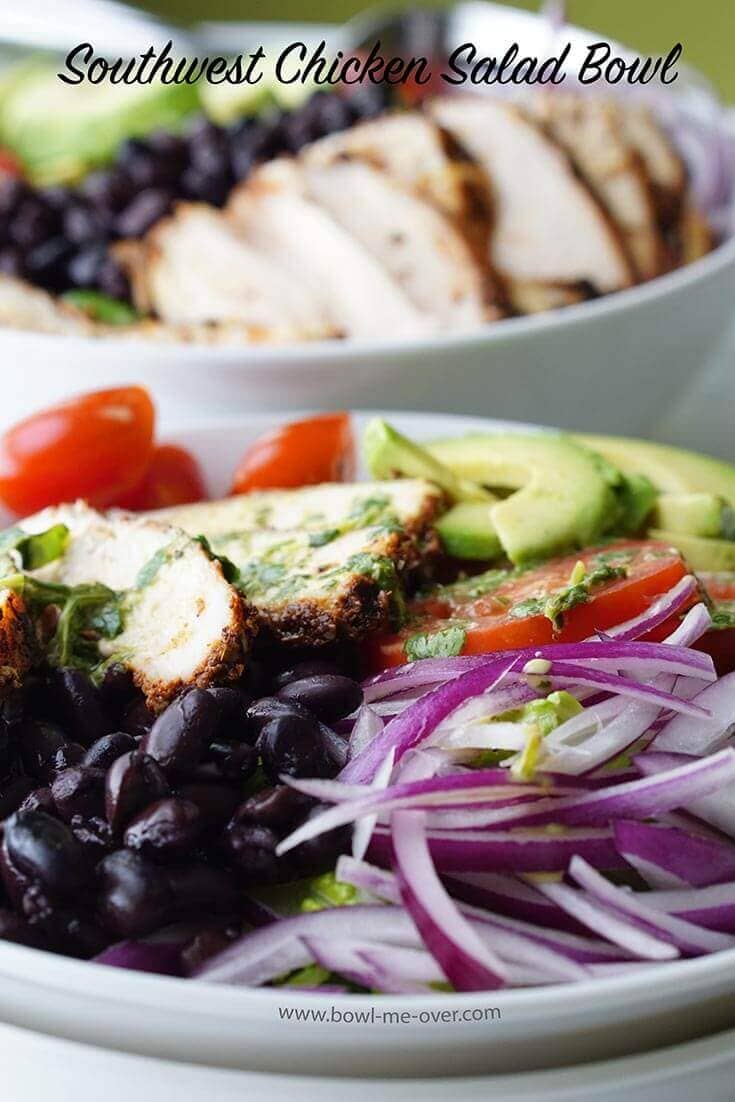 Two big salads in bowls.