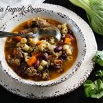 A steaming bowl of pasta Fagioli Soup filled with big meaty flavors and full of delicious vegetables.