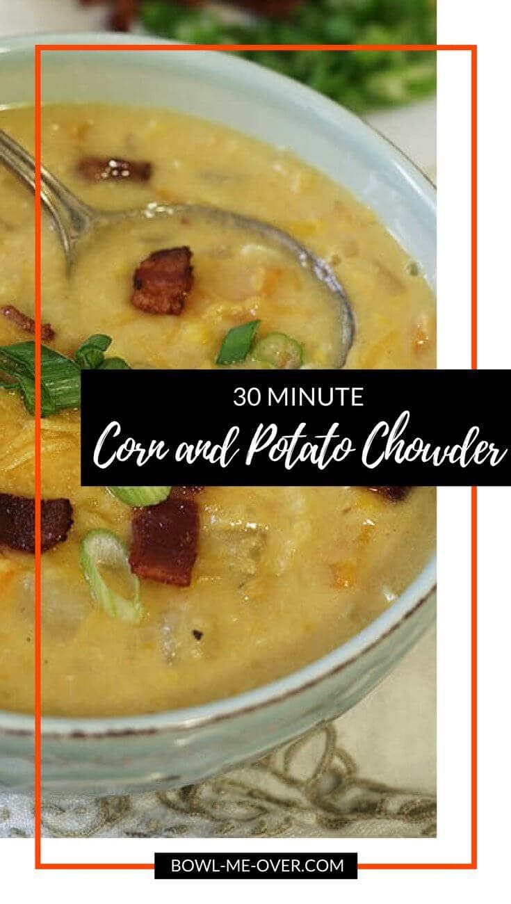 A hearty bowl of Corn and Potato Chowder topped with bacon, sliced green onions and cheese.