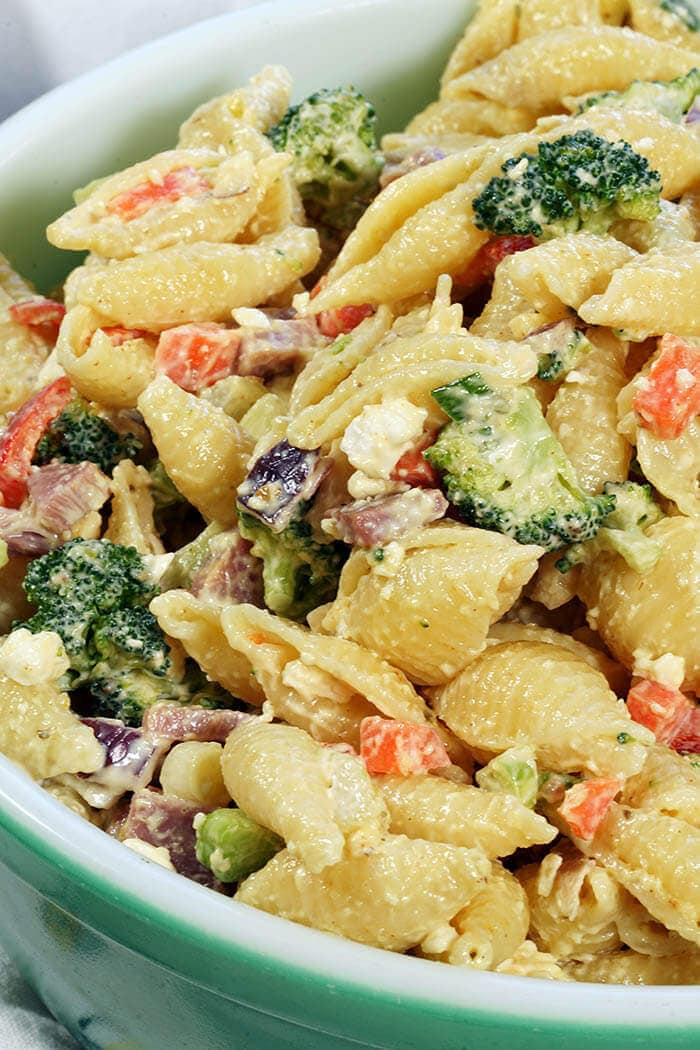 Ham, feta cheese and veggies are packed into Ham Pasta Salad and topped with a creamy mayonnaise dressing.