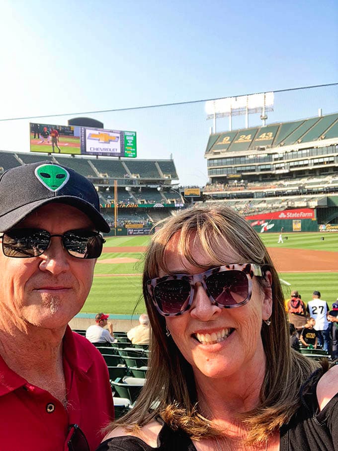 A little more about me - A picture of Dan and I at the Oakland A's game enjoying family fun night!