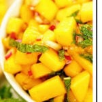 Mango Salsa Recipe fills a white bowl