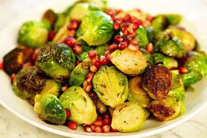 sautéed Brussel sprouts topped with pomegranate arils