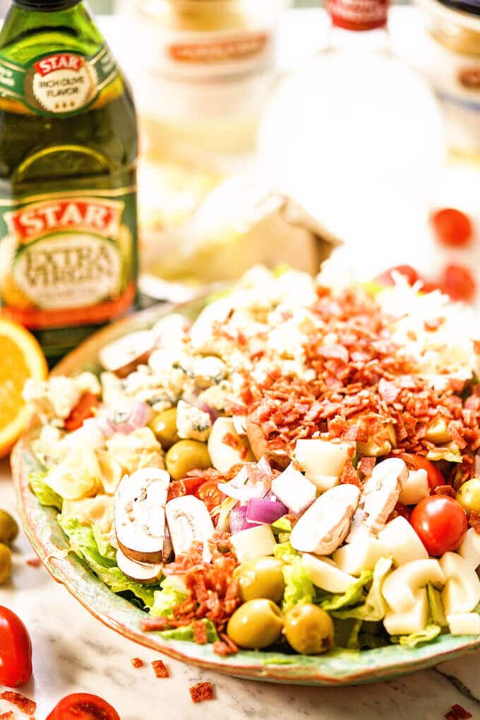 Steakhouse salad surrounded by the ingredients.
