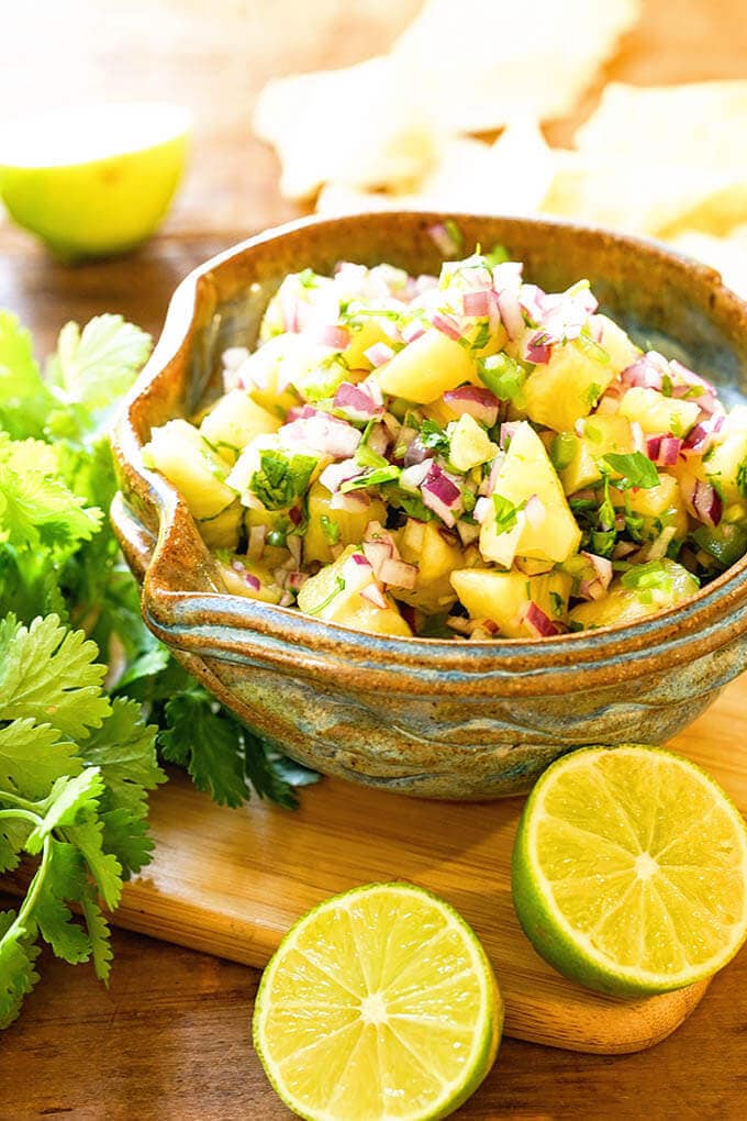 Pineapple Salsa Recipe in blue bowl with chips