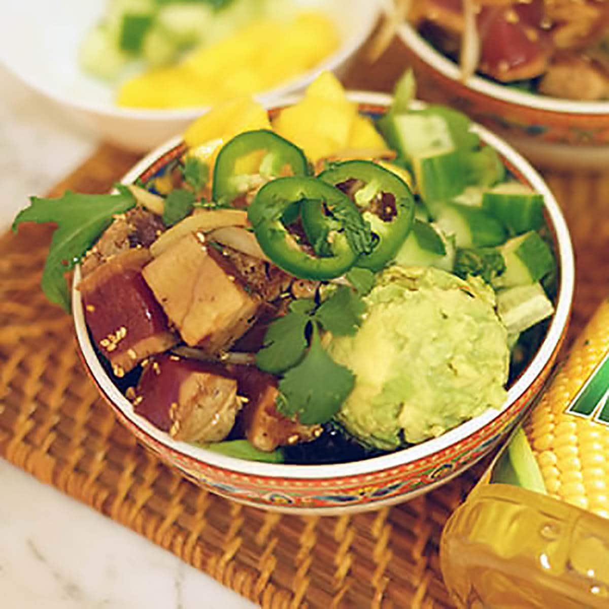 Tuna poke bowl with avocado, cucumber and jalapeños. 