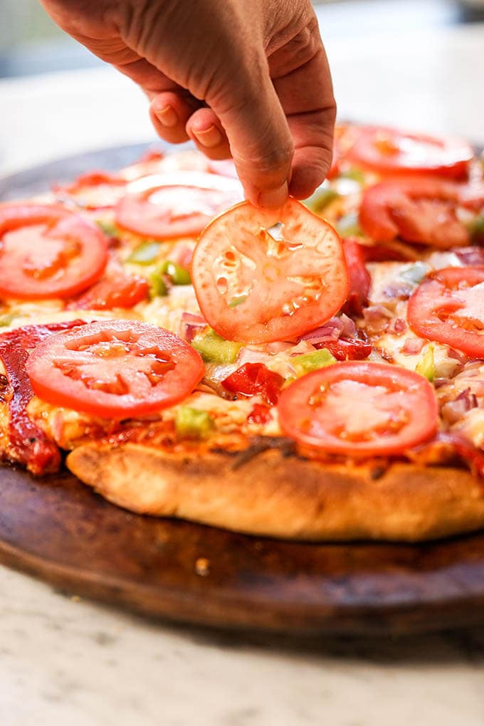 Quick easy homemade pizza recipes topped with tomatoes
