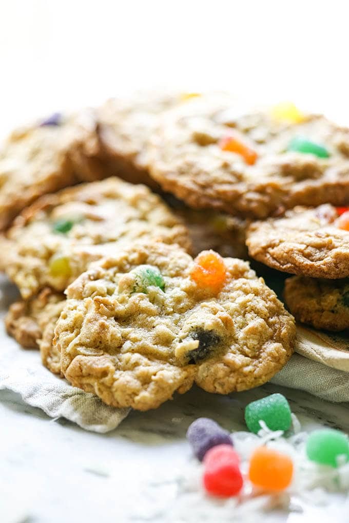 A pile cookies on white plate.