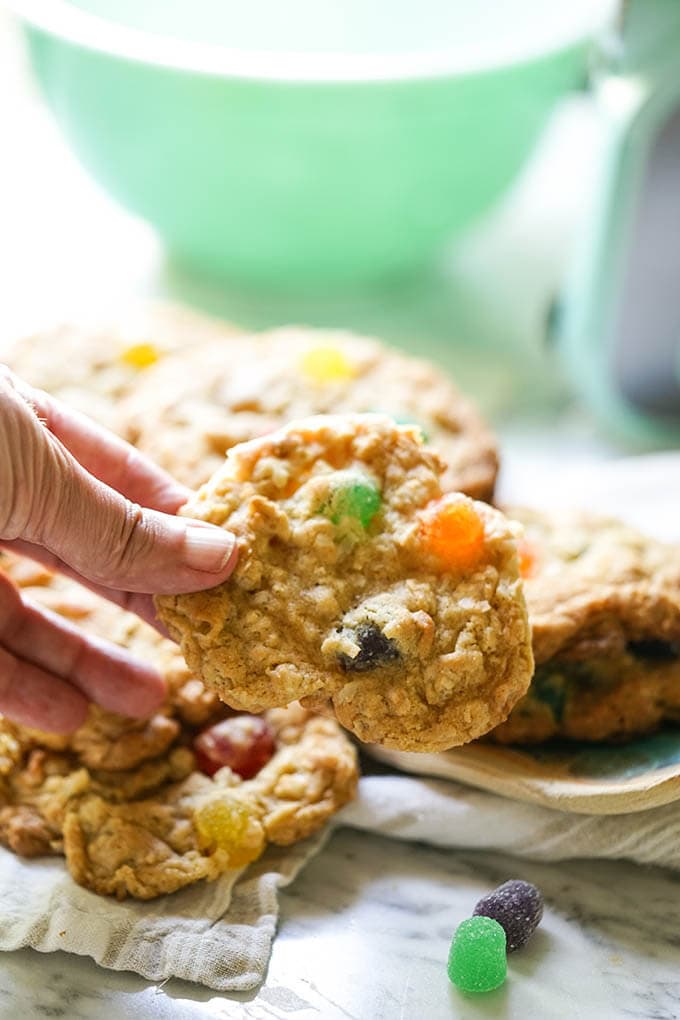 Hand holding oatmeal gumdrop cookies