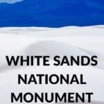 White Sands National Monument with blue hills rising in the distance.
