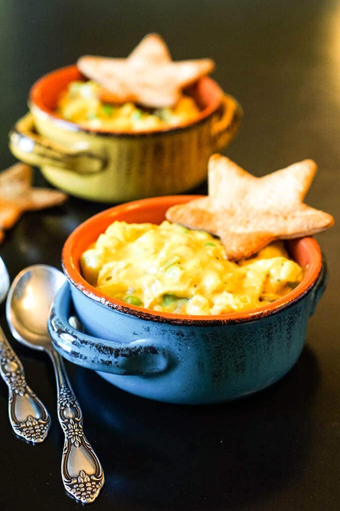 Easy Chicken Pot Pie Soup in bowls with crackers