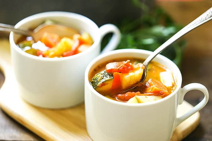 Vegetable Soup with Fire Roasted Tomatoes in bowls with spoons.