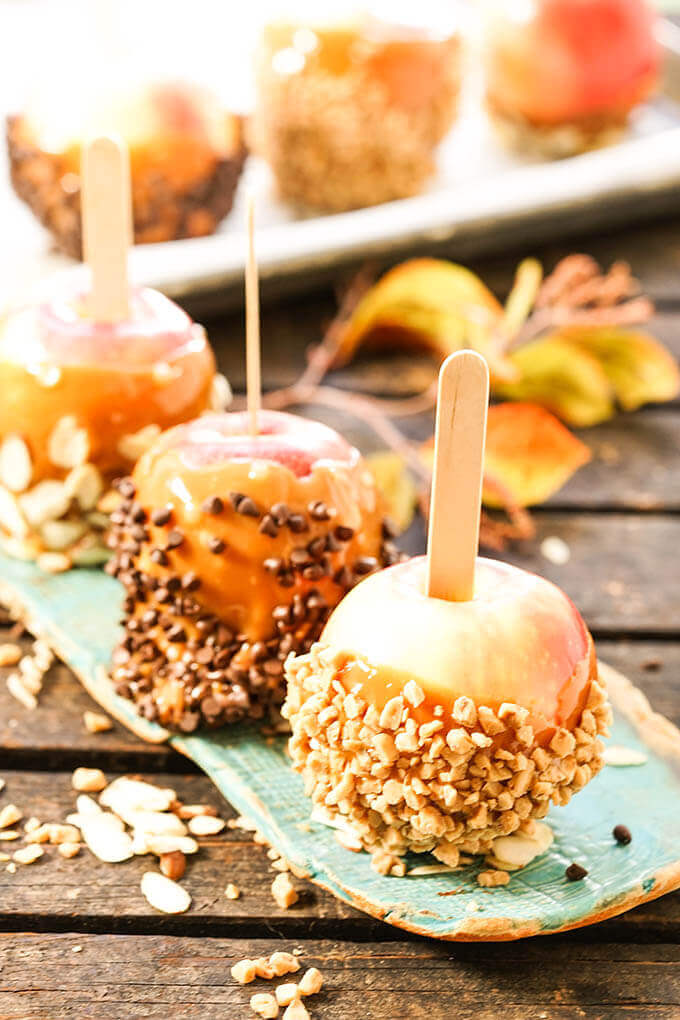 Gourmet Caramel Apples covered with chocolate and nuts.