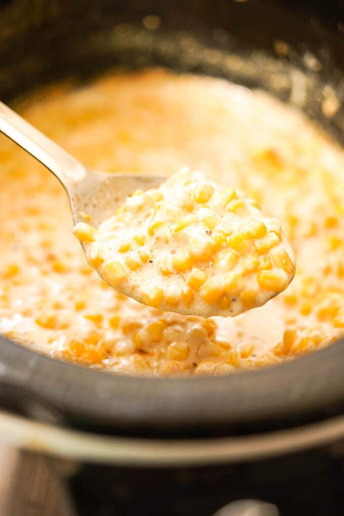 Crockpot Cream Corn with spoon