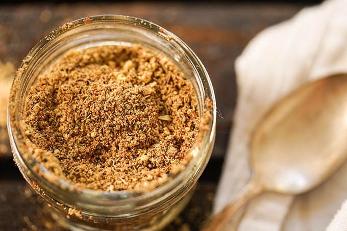 Old Bay spice mix in jar. 