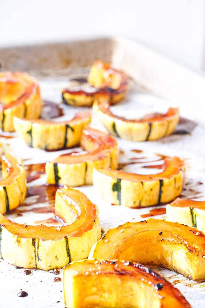 Roasted squash drizzled with glaze.
