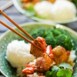 Sriracha Chicken in bowl with rice and broccoli.