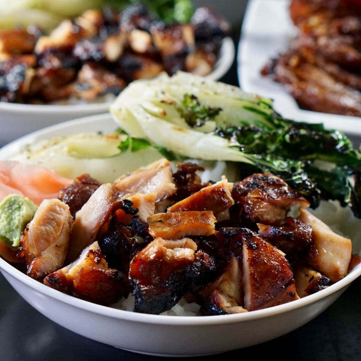 Grilled Teriyaki Chicken in a white bowl with vegetables