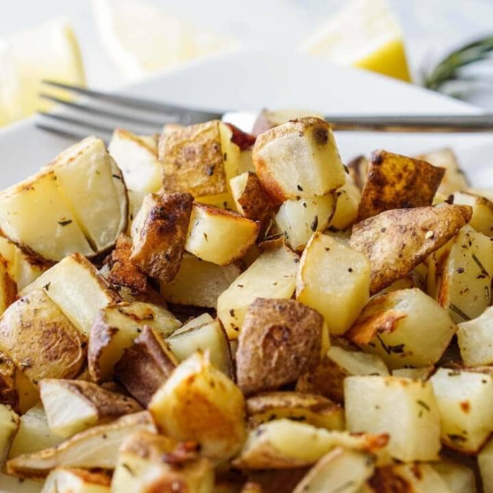 Oven Roasted Rosemary Potatoes - Bowl Me Over