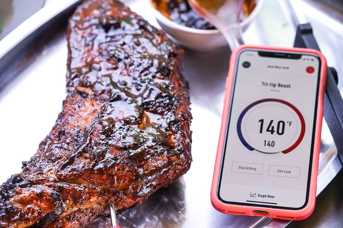 Steak on platter with thermometer.