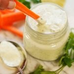 Carrot dipping into Cilantro Garlic Sauce