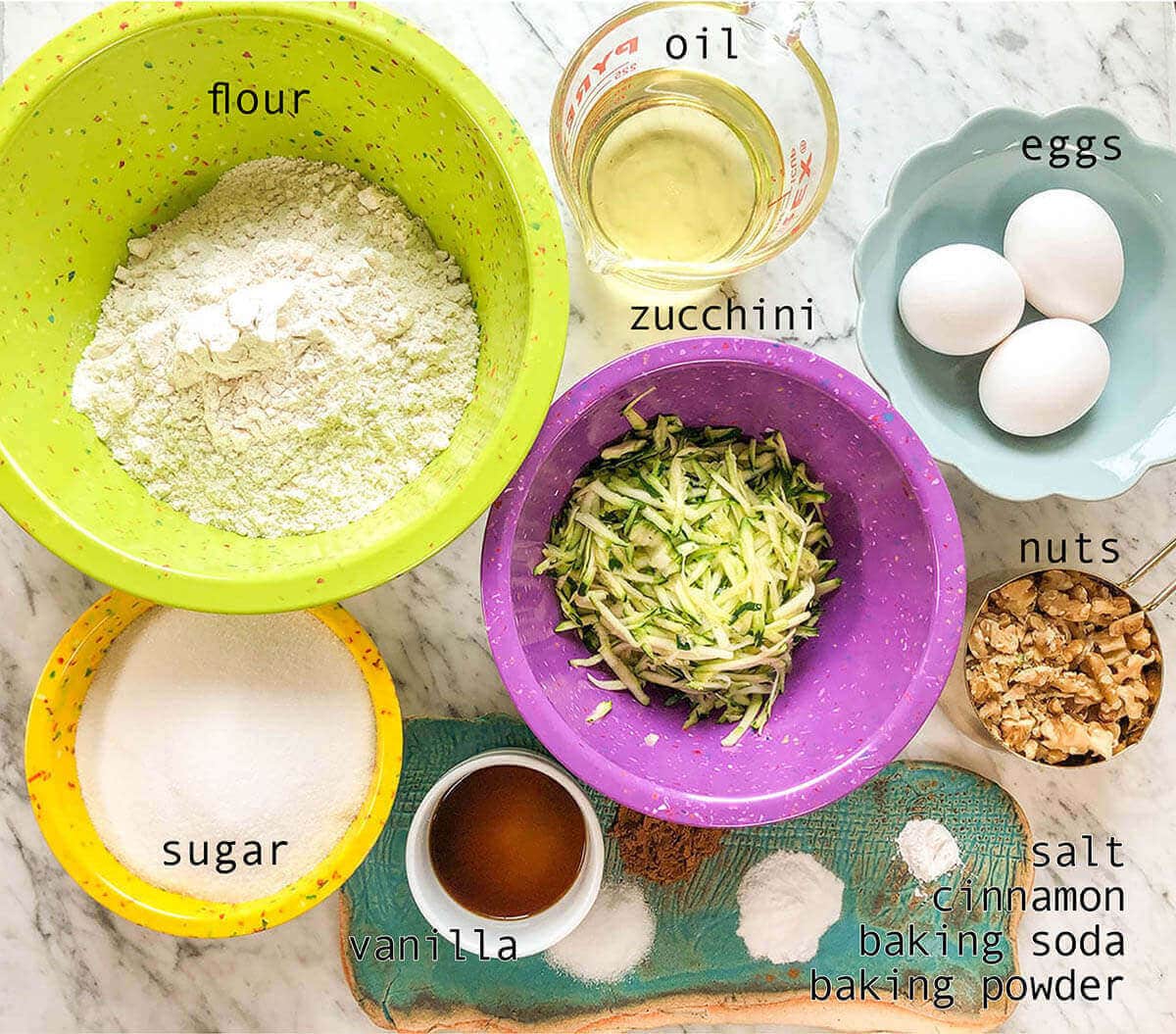 Ingredients for easy zucchini bread recipe, with print overlay.