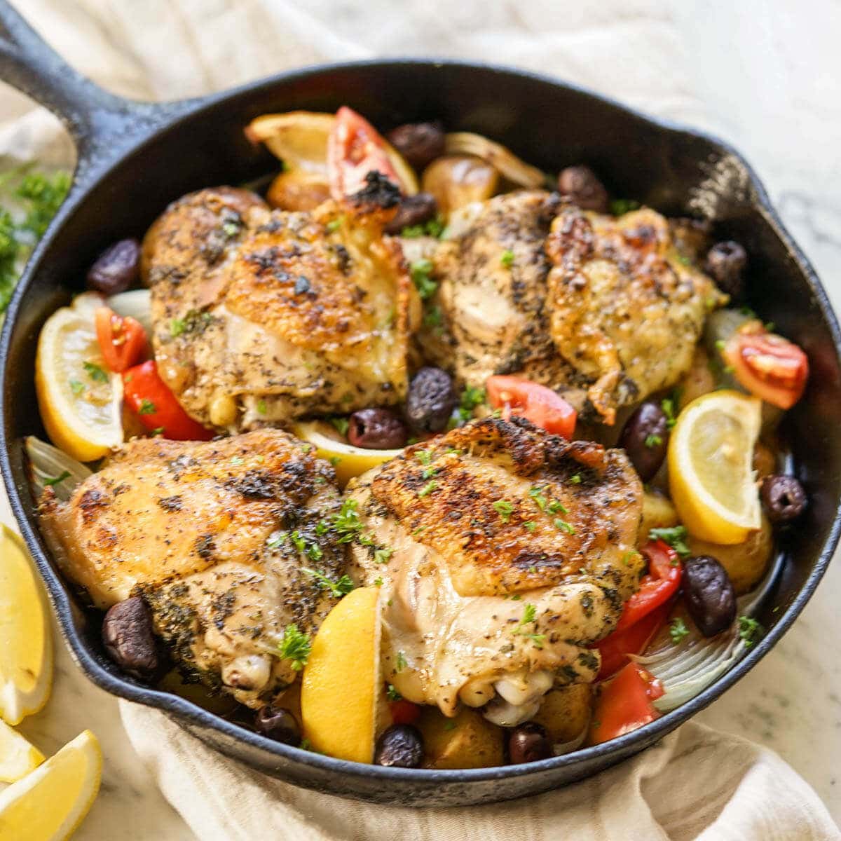 Chicken in cast iron skillet.