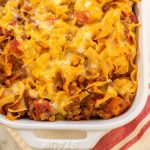 Beef and Noodle Casserole topped with melted cheese.