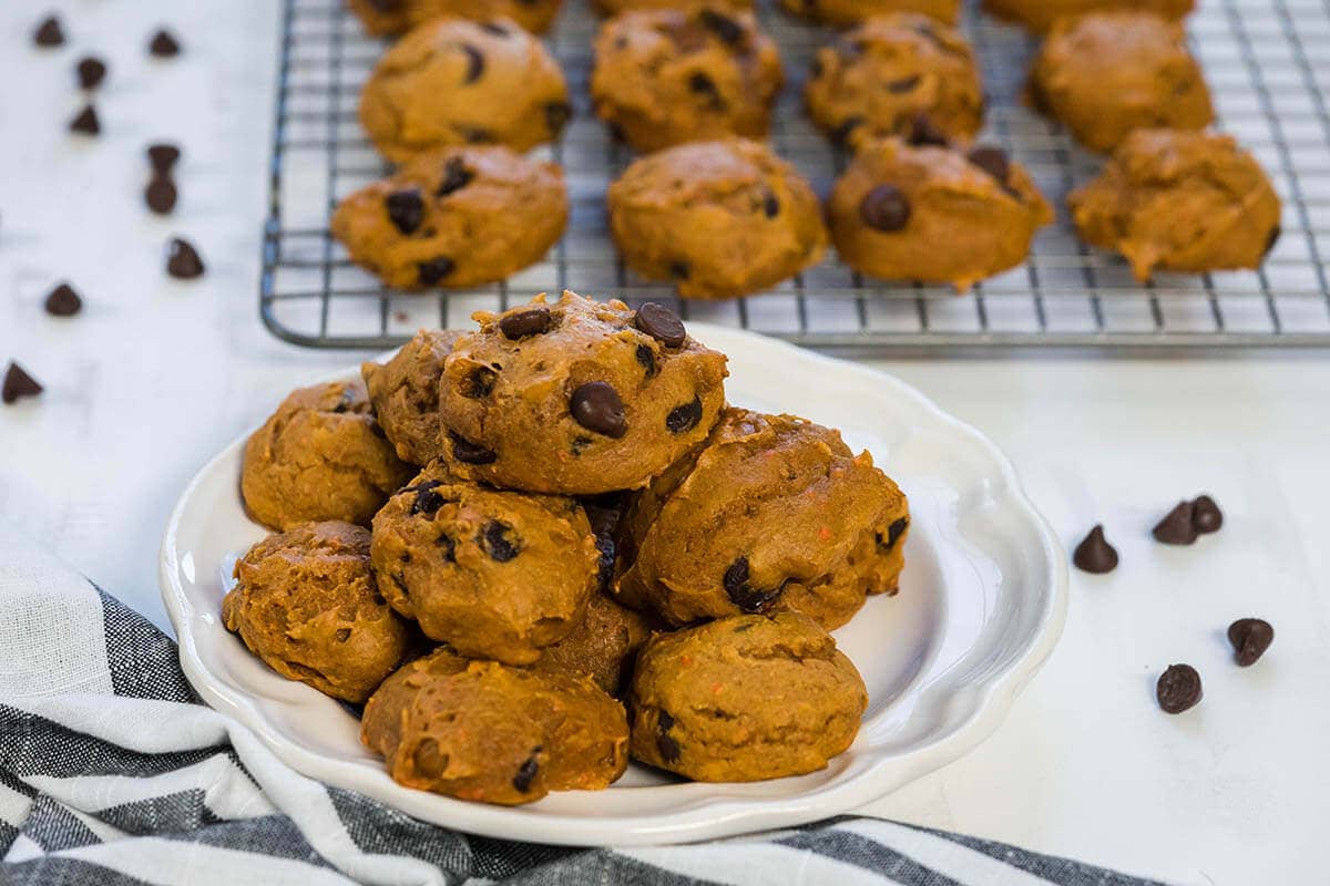 Plate of cookies surrounded by chocolate chips