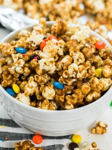 Caramel Popcorn topped with candy and sprinkles.