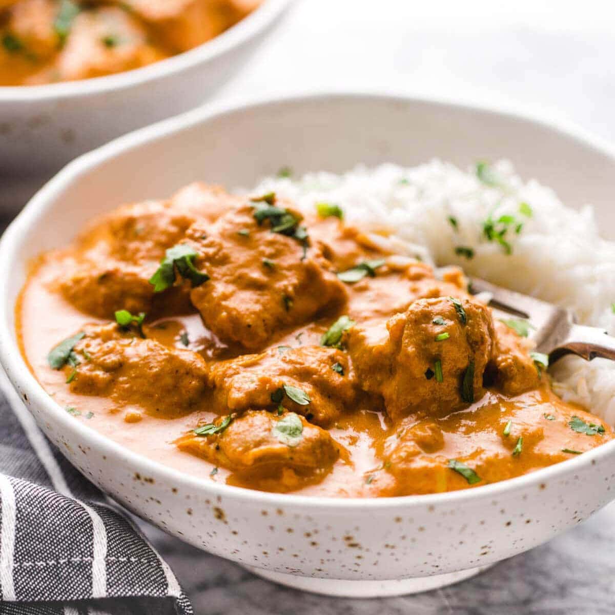 Easy Instant Pot Recipe Butter Chicken served with rice.