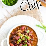 Overhead view of chili in a bowl with text overlay for Pinterest.