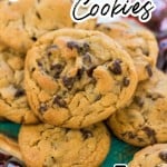 Snickers Chocolate Chip Cookies on platter with Pinterest overlay.