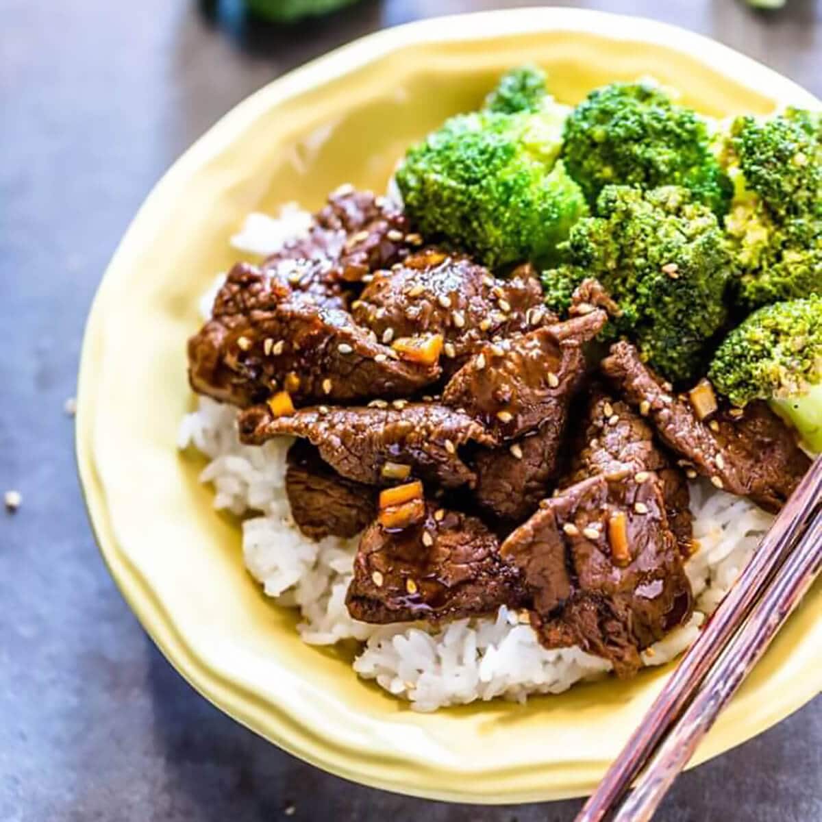Broccoli Beef in bowl with rice.