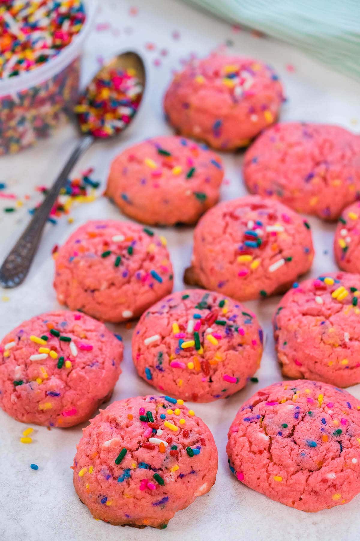 Biscuits on plate surrounded by sprinkles.