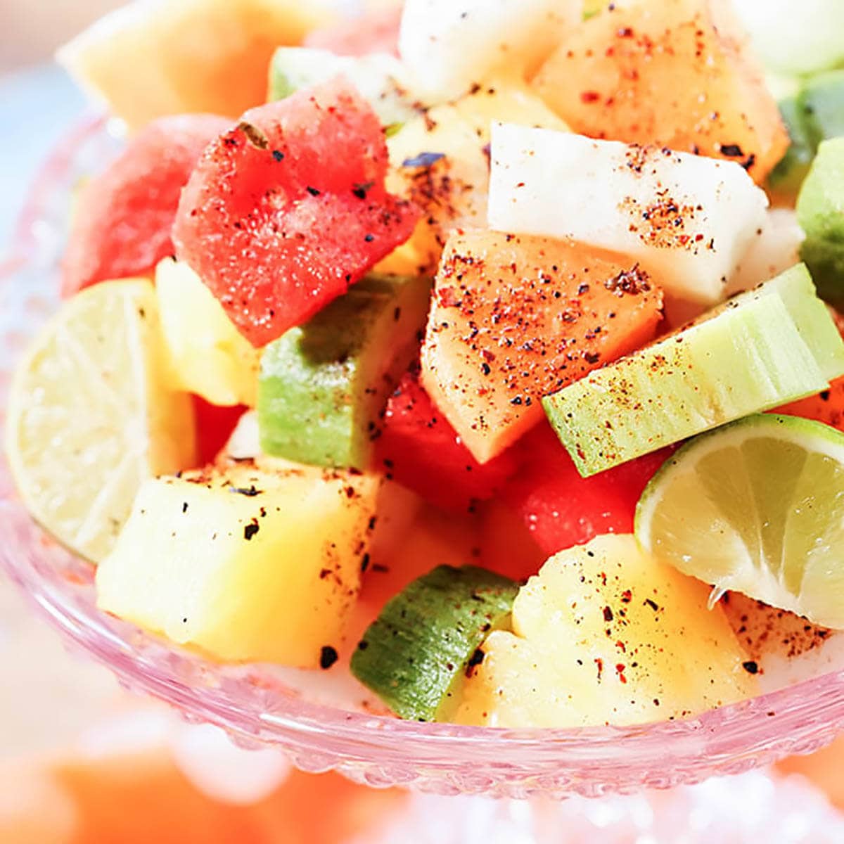 https://bowl-me-over.com/wp-content/uploads/2021/01/Mexican-Fruit-Salad-with-Tajin.jpg