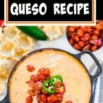 Velveeta Cheese Dip in cast iron skillet topped with tomatoes and jalapeños.