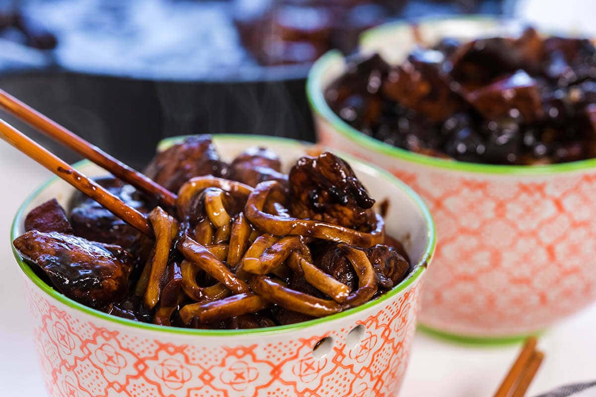 Korean Black Bean Noodles in bowls served with chopsticks.