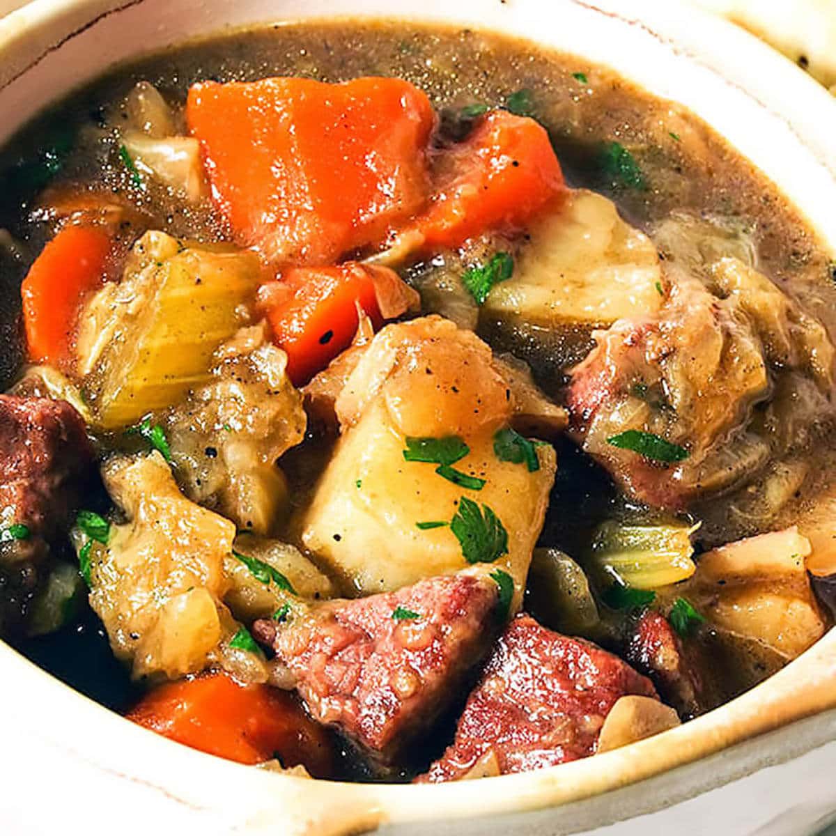 Corned Beef Stew in white bowl.